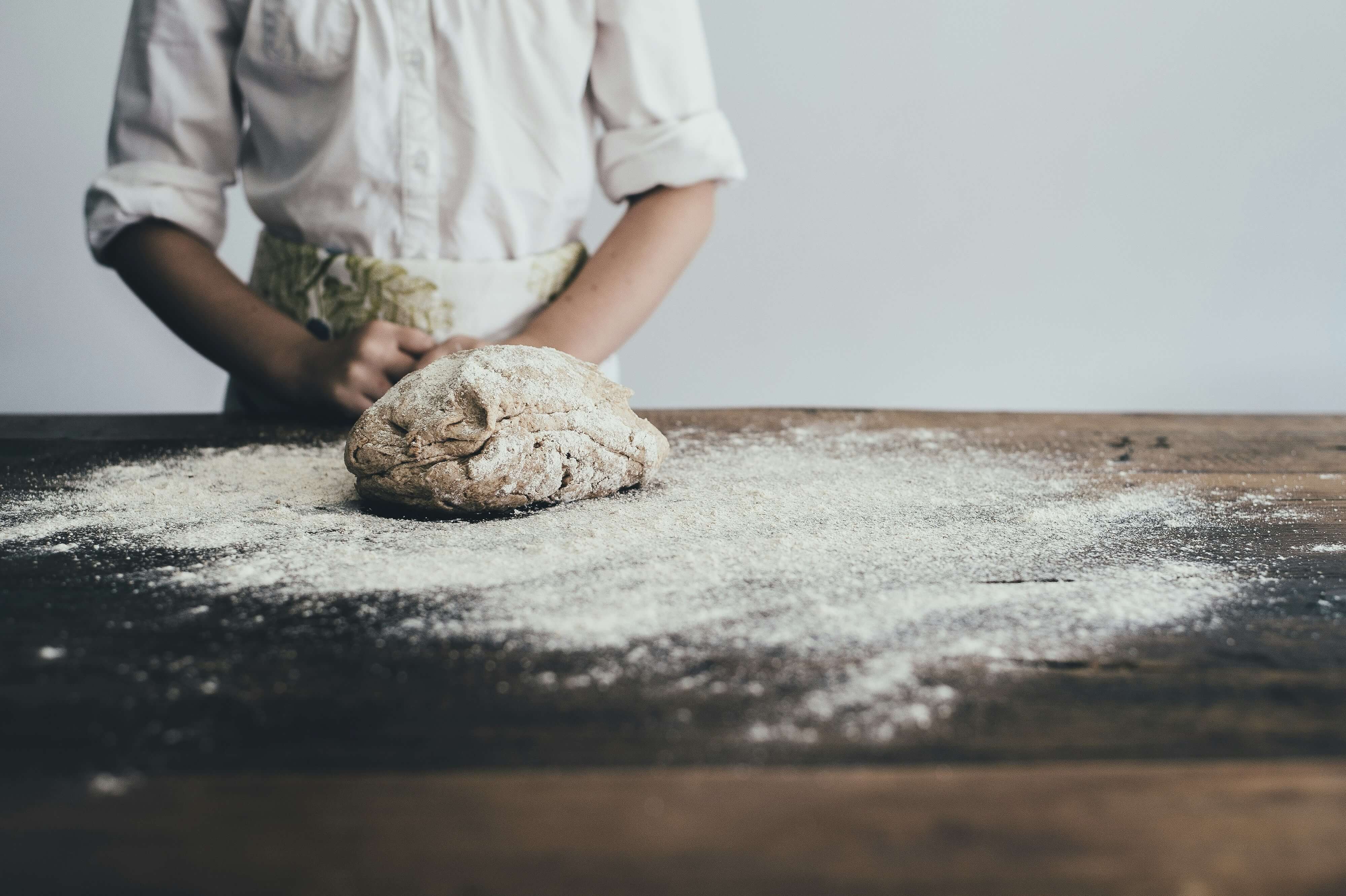 Students learning baking techniques in our professional kitchen