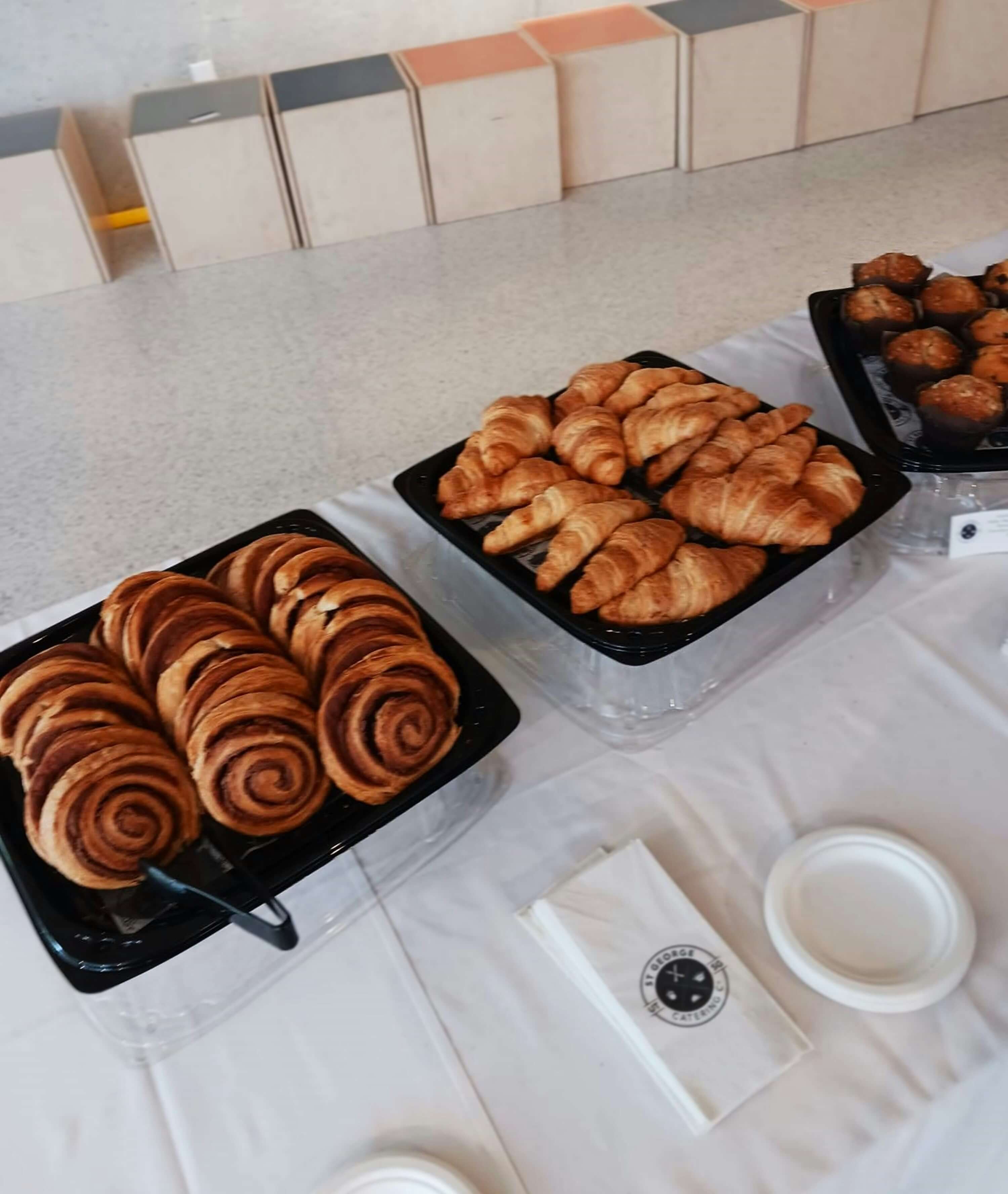 Elegant catering spread with assorted pastries and desserts